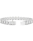 15CT BEZEL EMERALD CUT DIAMOND TENNIS BRACELET - 9CT GOLD