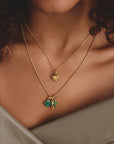Gold-Plated Four-Leaf Clover Charm with Green Heart-Cut Stones