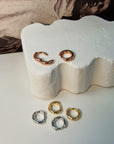 THE PLAIN HUGGIE EARRINGS- STERLING SILVER