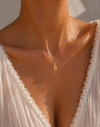 9CT GOLD '18' PENDANT