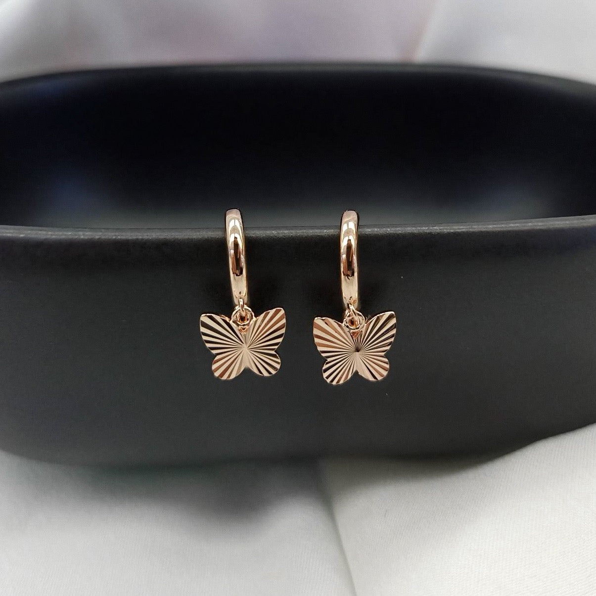 WINGS HUGGIE EARRINGS - STERLING SILVER