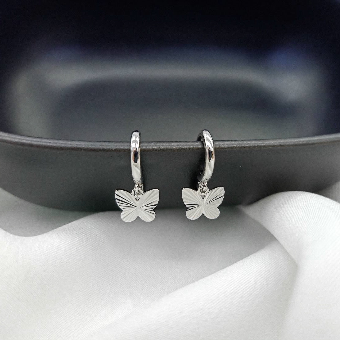 WINGS HUGGIE EARRINGS - STERLING SILVER