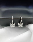 WINGS HUGGIE EARRINGS - STERLING SILVER