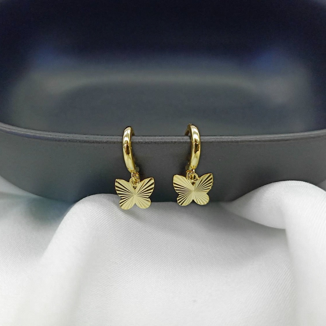 WINGS HUGGIE EARRINGS - STERLING SILVER