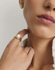 Halo ring with mother-of-pearl and zirconia
