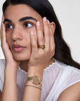 Daniel Wellington Petite Reflection Gold Watch