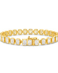 15CT BEZEL EMERALD CUT DIAMOND TENNIS BRACELET - 9CT GOLD