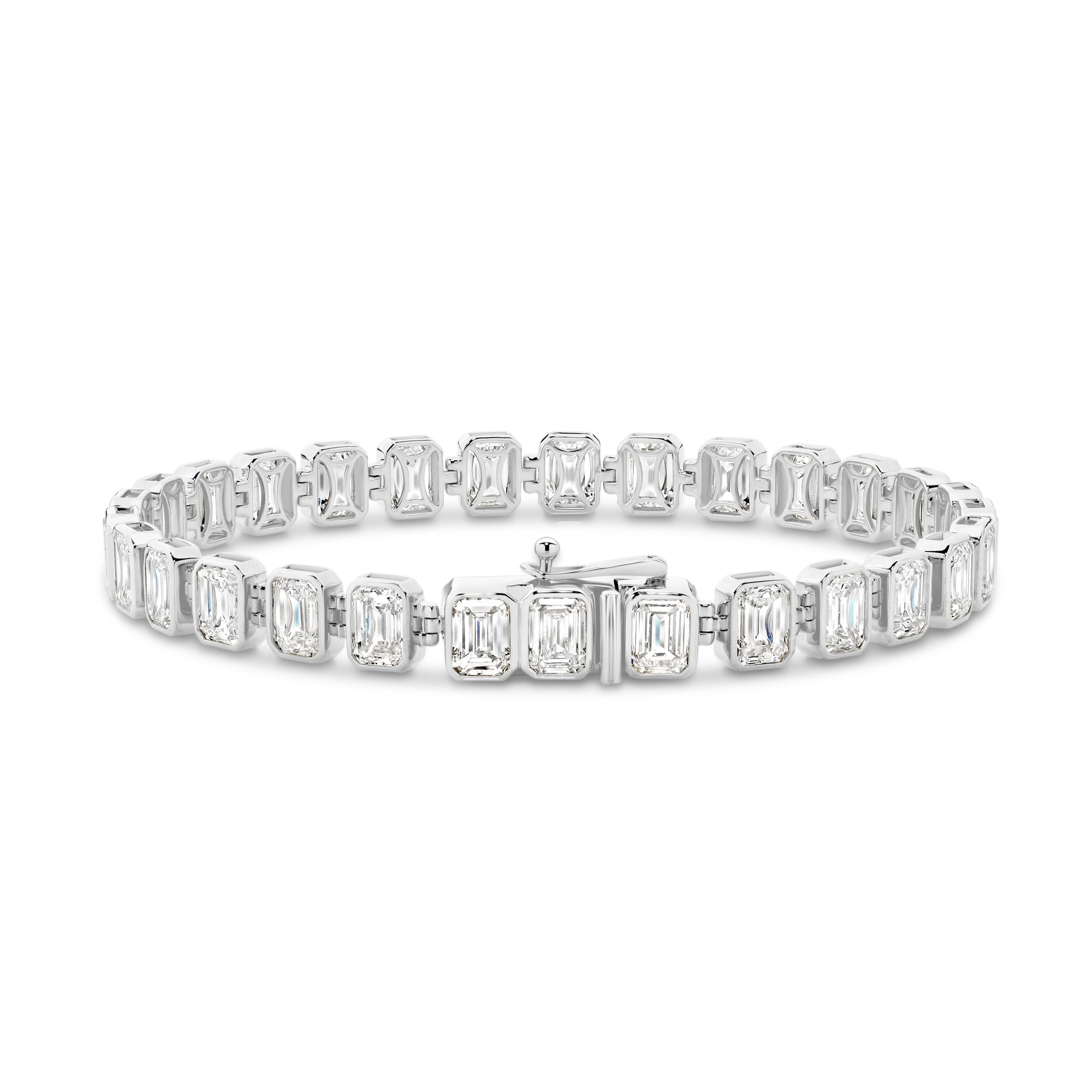 15CT BEZEL EMERALD CUT DIAMOND TENNIS BRACELET - 9CT GOLD