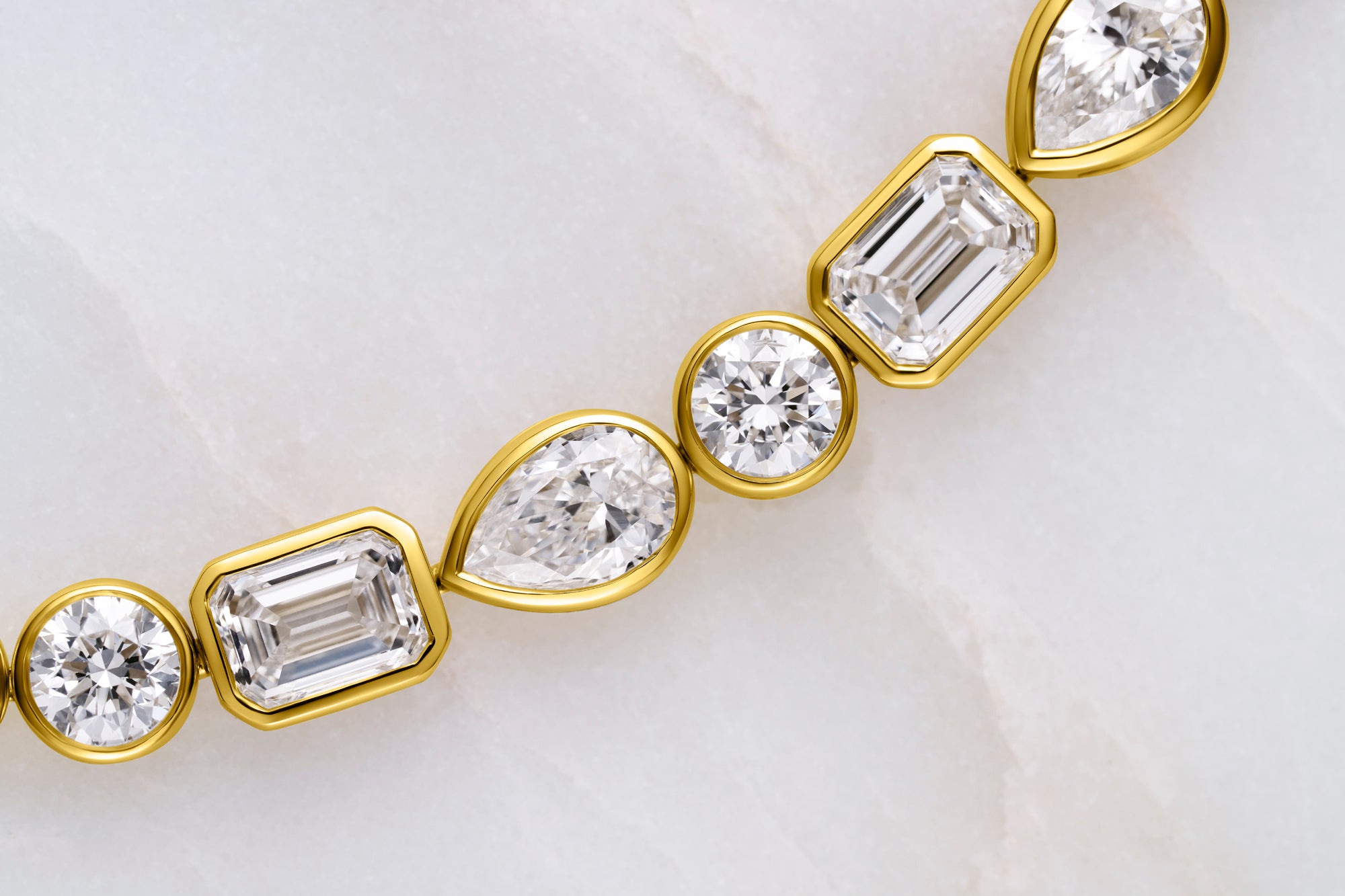 10.5CT TDW MIXED SHAPE DIAMOND TENNIS BRACELET - 9CT GOLD