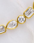 10.5CT TDW MIXED SHAPE DIAMOND TENNIS BRACELET - 9CT GOLD