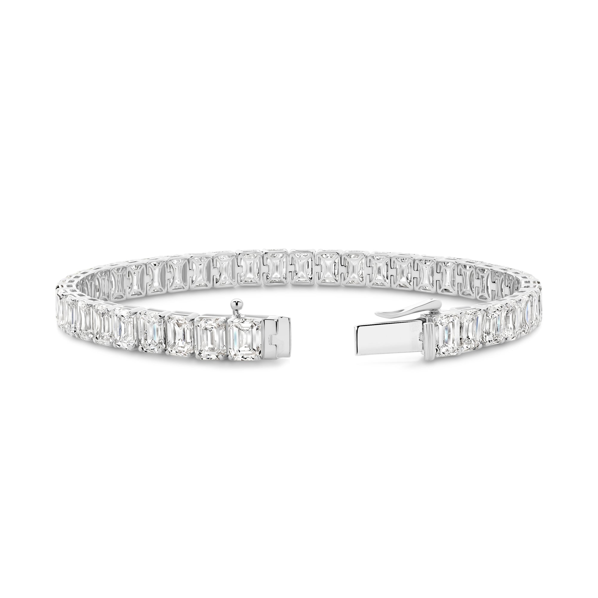 21CT TDW EMERALD CUT DIAMOND TENNIS BRACELET - 9CT GOLD