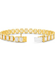 15CT BEZEL EMERALD CUT DIAMOND TENNIS BRACELET - 9CT GOLD