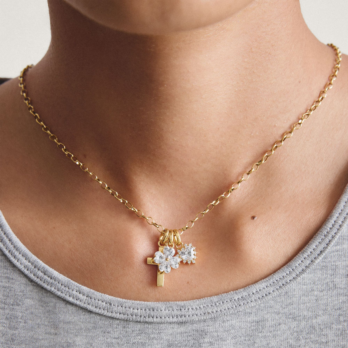 Gold-Plated Four-Leaf Clover Charm with Heart-Cut White Zirconia