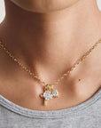 Gold-Plated Four-Leaf Clover Charm with Heart-Cut White Zirconia
