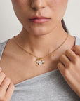 Gold-Plated Four-Leaf Clover Charm with Heart-Cut White Zirconia