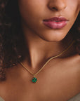 Gold-Plated Four-Leaf Clover Charm with Green Heart-Cut Stones