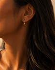 AMARA PEARL HUGGIE EARRINGS- STERLING SILVER