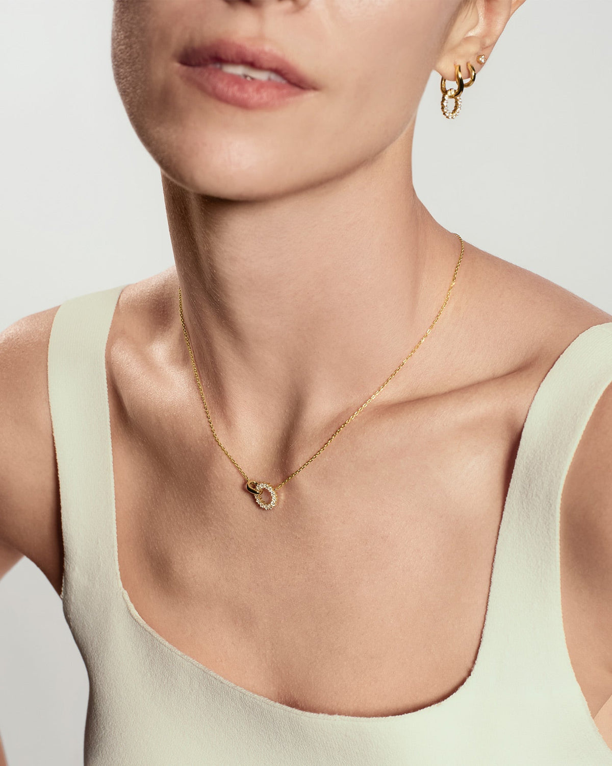 Gold Pave Interlocked Huggie Hoop Earrings